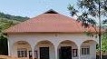 FRONT VIEW OF THE SCHOOL MULTIPURPOSE HALL